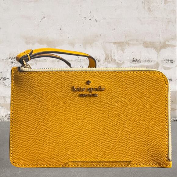 kate spade Handbags - Kate Spade NWT Lucy Bicolor L-Zip Wristlet in Daffodil